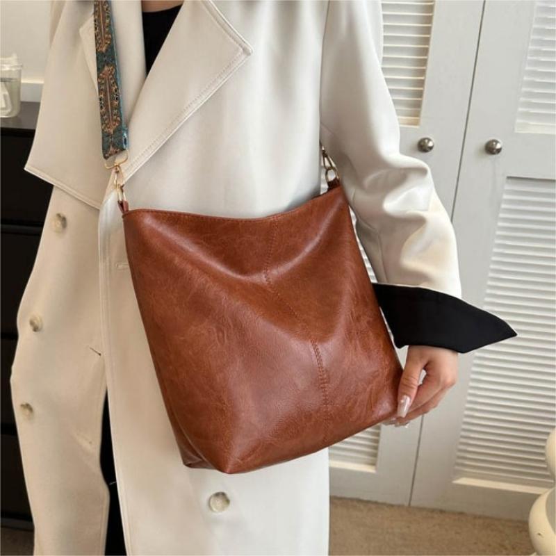 Zora - Sac bandoulière spacieux bohème chic avec design abstrait bandoulière et simili cuir