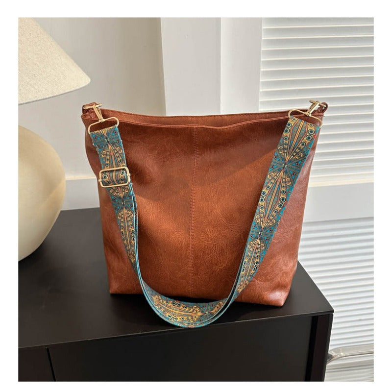 Zora - Sac bandoulière spacieux bohème chic avec design abstrait bandoulière et simili cuir