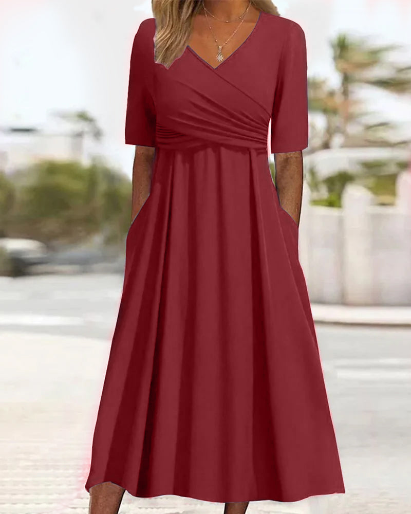 Mila – Robe de Printemps Luxe à Faux Portefeuille avec Manches Mi-longues Plissées