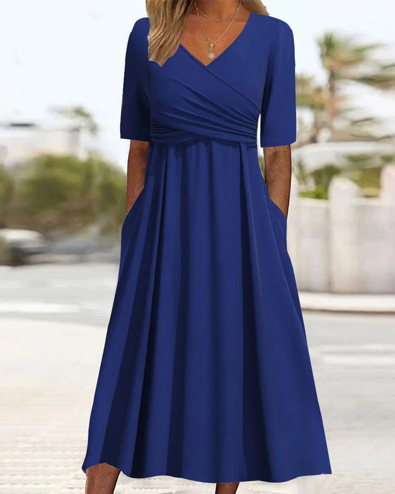 Mila – Robe de Printemps Luxe à Faux Portefeuille avec Manches Mi-longues Plissées