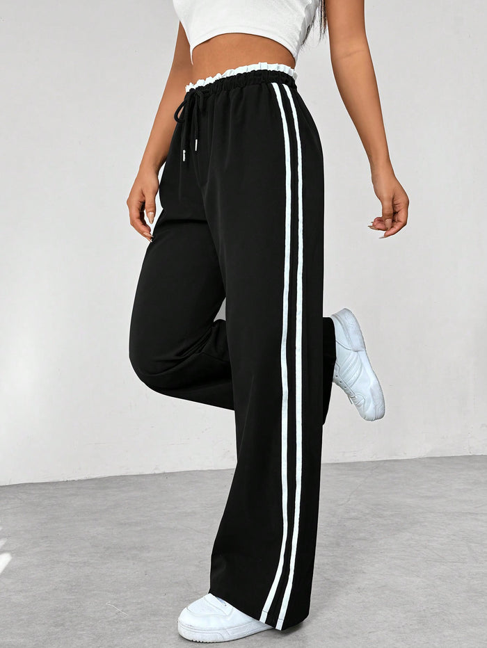 Lena - Pantalon Jogging Noir avec Rayures Latérales Blanches