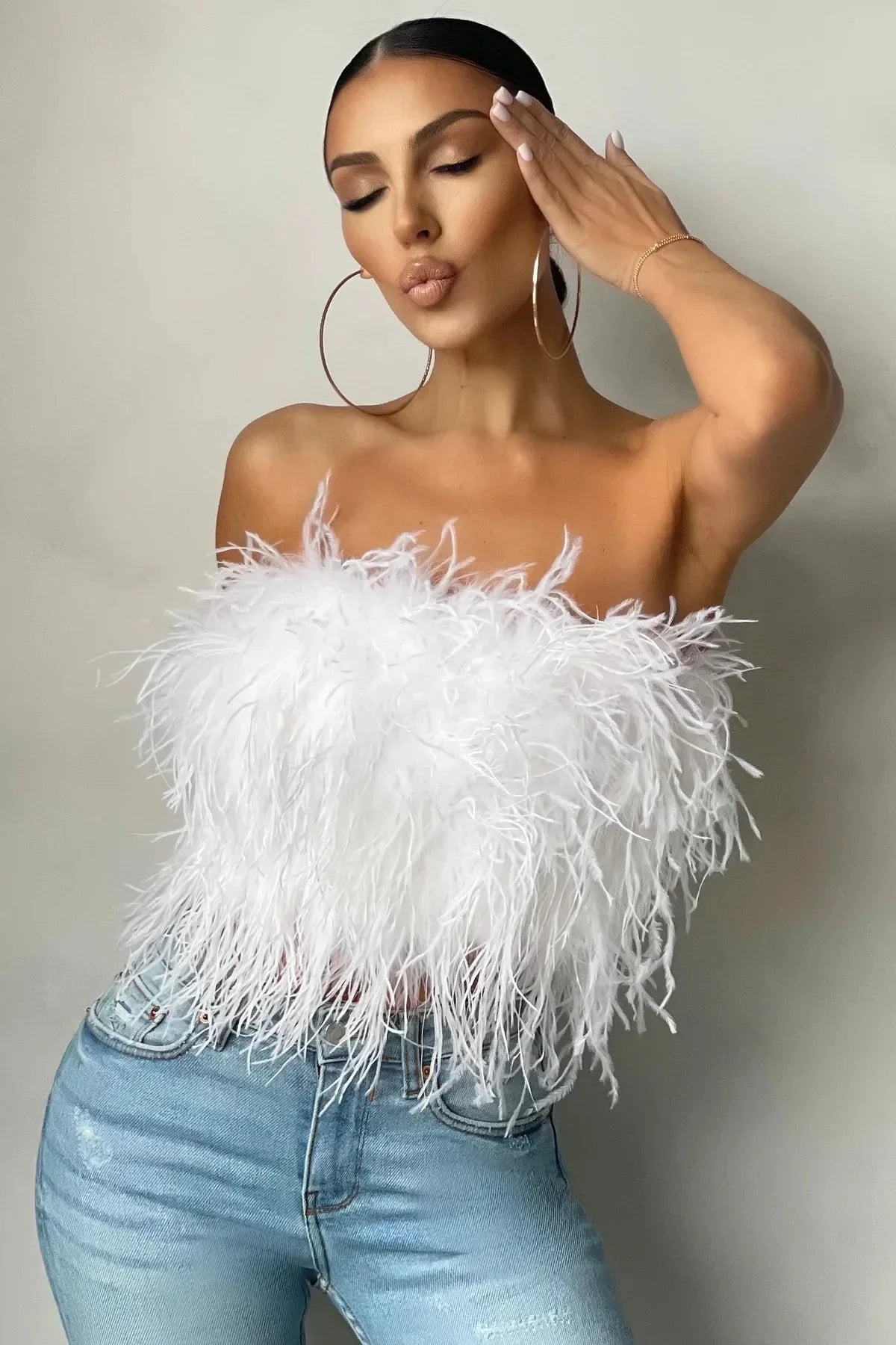 Delphine Top en Plumes | Le crop top en plumes élégant est une tendance phare cette année
