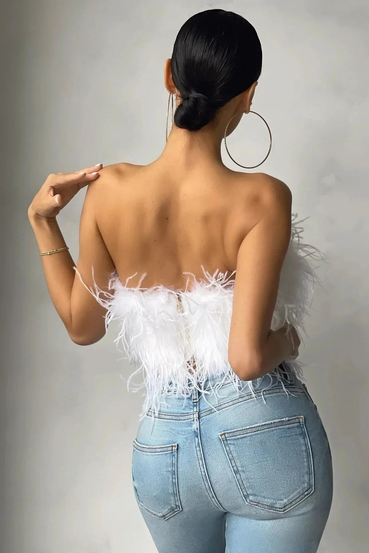 Delphine Top en Plumes | Le crop top en plumes élégant est une tendance phare cette année