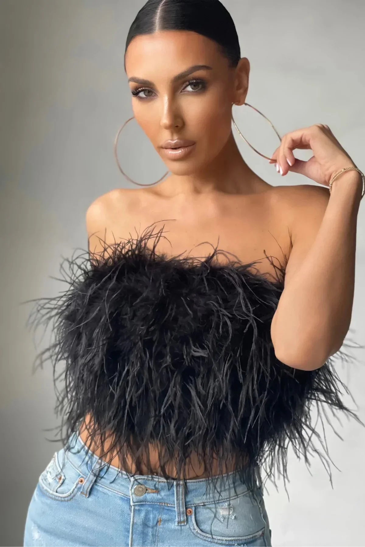 Delphine Top en Plumes | Le crop top en plumes élégant est une tendance phare cette année