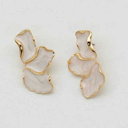 Sophia – Boucles d’oreilles dorées à l’or fin en forme abstraite