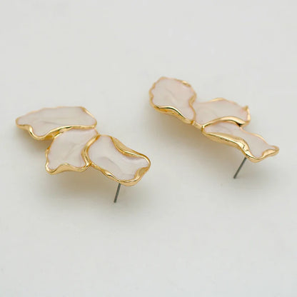 Sophia – Boucles d’oreilles dorées à l’or fin en forme abstraite