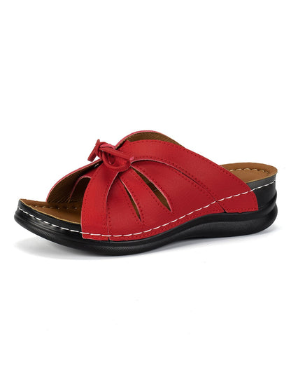 Lyric - Sandales orthopédiques à semelles amortissantes avec design élégant en cuir vegan et nœud sur le devant disponibles en couleurs unies estivales