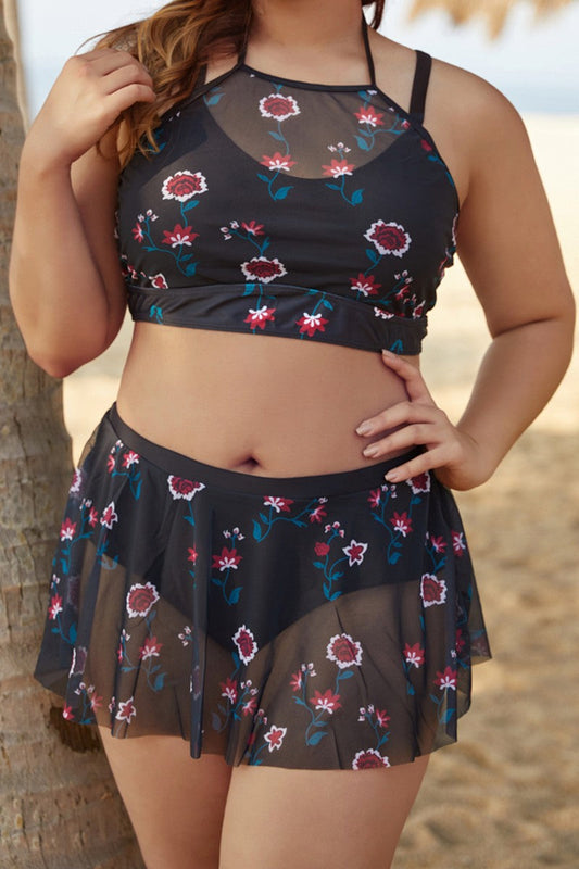 Ella - Bikini deux pièces grande taille avec jupe-short et top halter transparent noir orné de fleurs rouges et bretelles réglables
