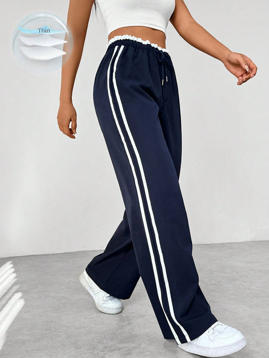 Lena - Pantalon Jogging Noir avec Rayures Latérales Blanches