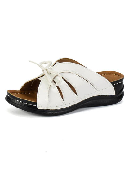 Lyric - Sandales orthopédiques à semelles amortissantes avec design élégant en cuir vegan et nœud sur le devant disponibles en couleurs unies estivales