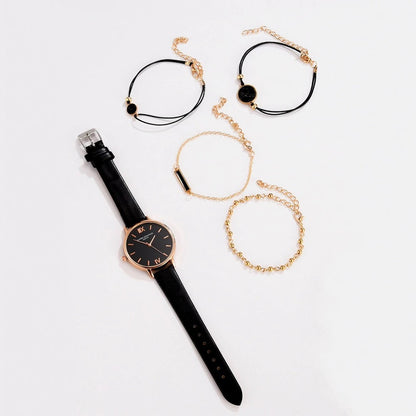 Montre analogique à quartz avec 4 bracelets assortis pour un look féminin élégant